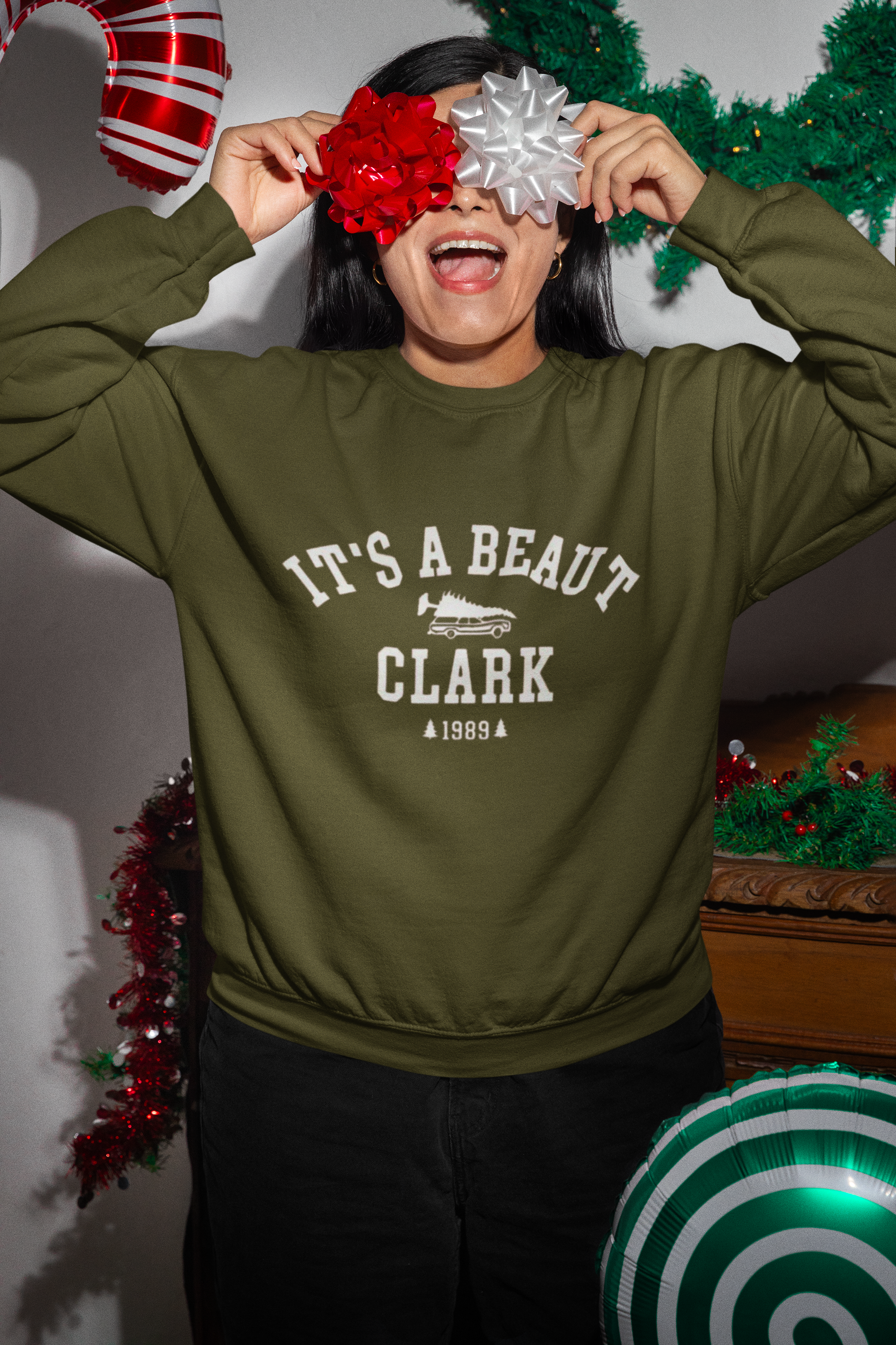 gildan-sweatshirt-mockup-featuring-a-cheerful-woman-celebrating-christmas-with-ribbons-on-her-eyes-m35928_1.png