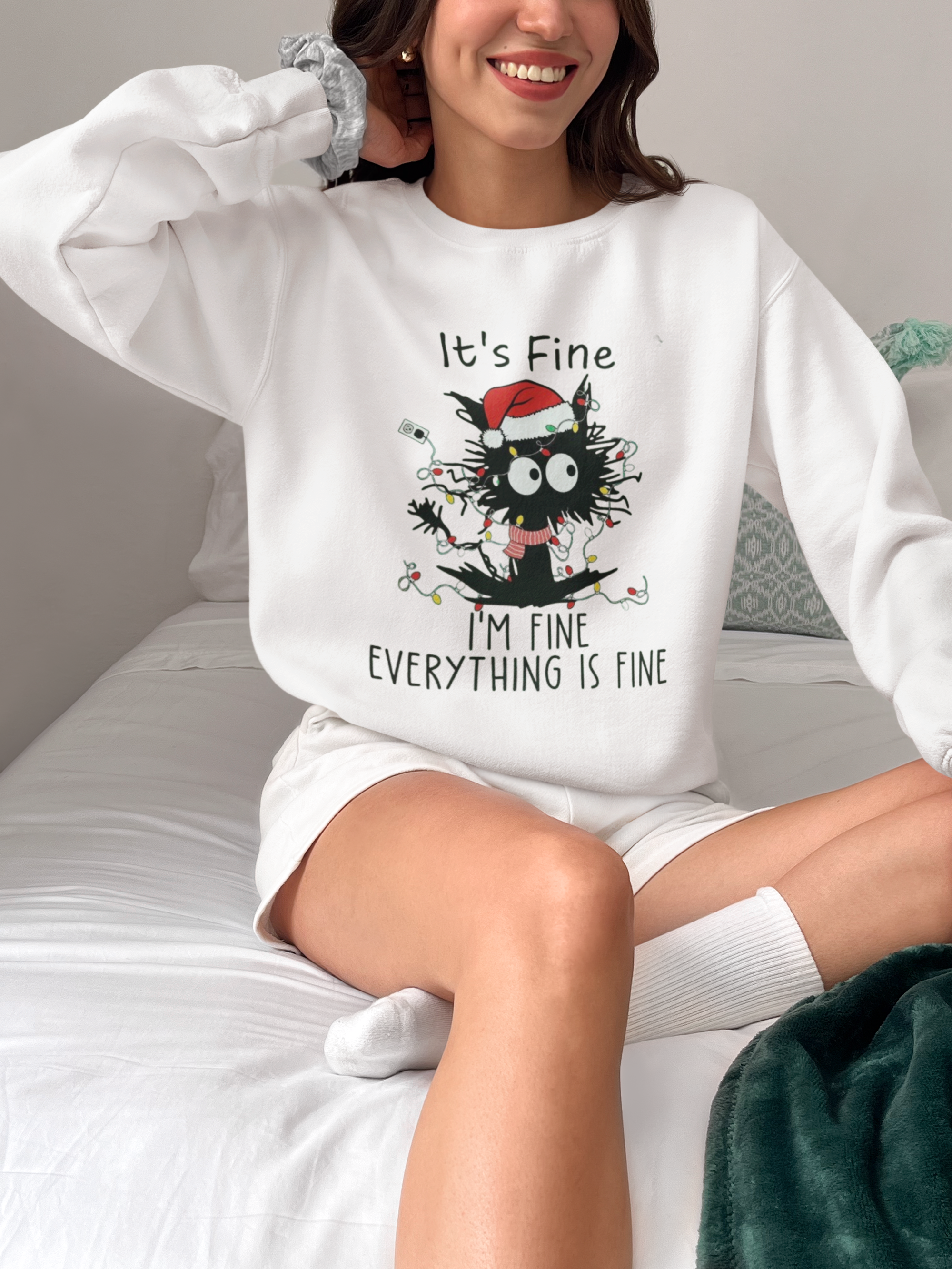 gildan-sweatshirt-mockup-of-a-happy-woman-posing-on-a-bed-m37323.png