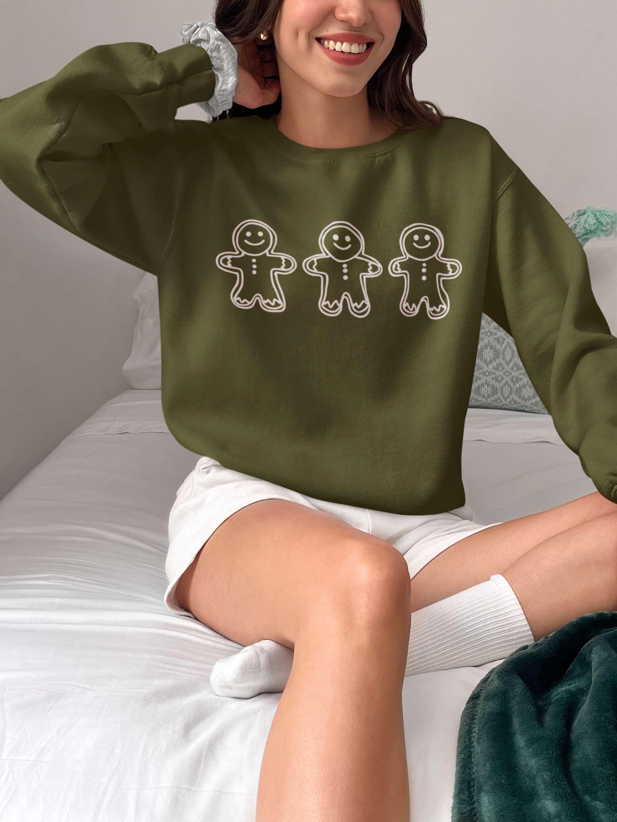 gildan-sweatshirt-mockup-of-a-happy-woman-posing-on-a-bed-m37323_a3ea425f-402a-4b44-851c-ce56a7acb72e.png